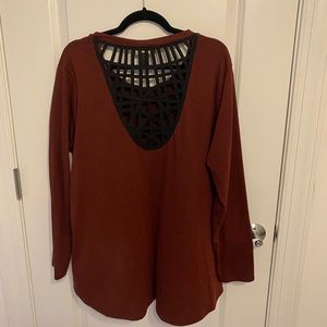 Rust color cut out back long sleeve shirt